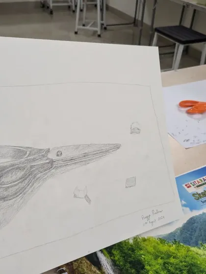 The pencil sketch version of our scissors object study. This drawing focuses on capturing the form, highlights, and shadows before adding color.