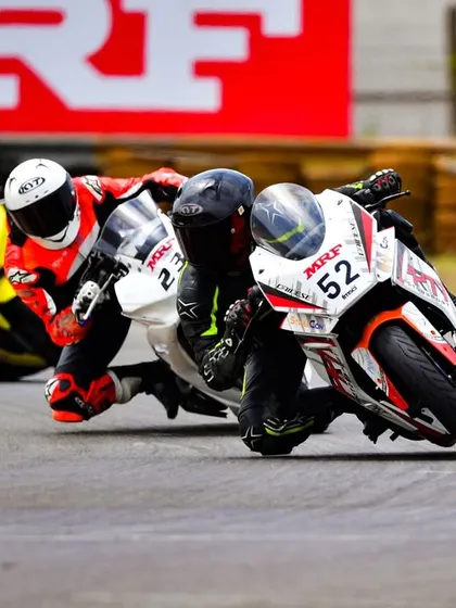 An incredible shot of Swaroop leading a pack of riders into a corner, showcasing his aggressive racecraft and determination to fight for the podium.