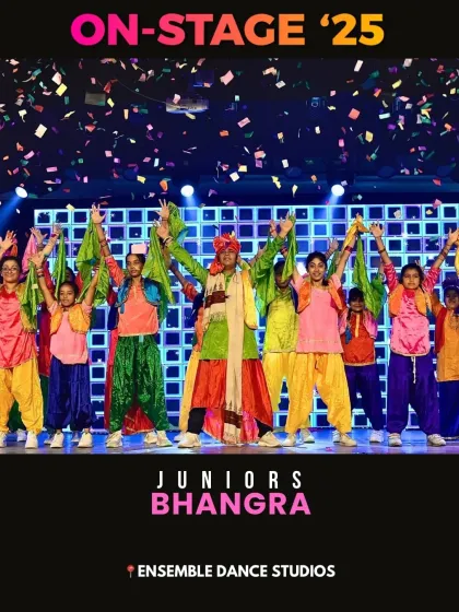Our juniors Bhangra group celebrating on stage. This high-energy folk dance is a fantastic workout and a joyful performance style.