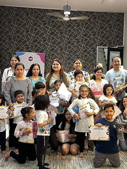 The whole gang! Another group of proud graduates from our kids' summer camp. It's a joy to see so many happy faces in one frame.