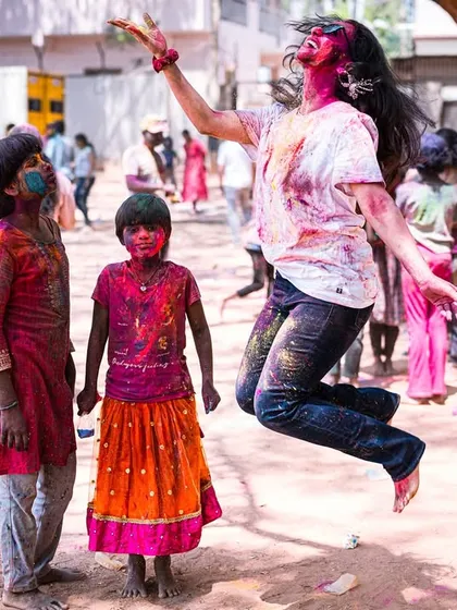 Capturing the peak of Holi fun. This is the kind of high-energy, joyful moment I love to create at festival parties, getting everyone, including the kids, to jump, dance, and celebrate with color.