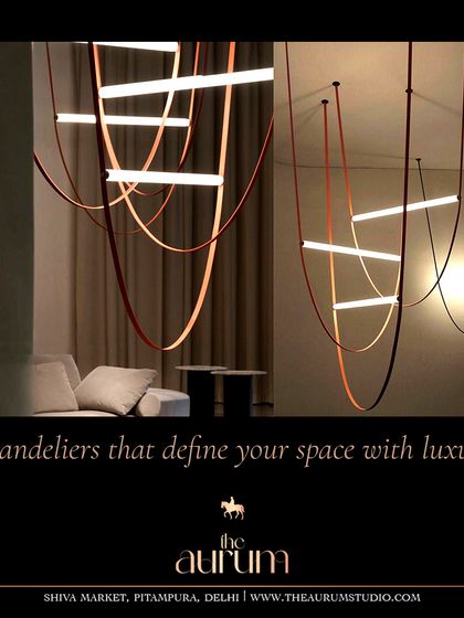 This minimalist LED chandelier is a masterpiece of modern design. Its suspended, ribbon-like forms create a sense of weightlessness and architectural beauty, perfect for a contemporary, art-forward home.
