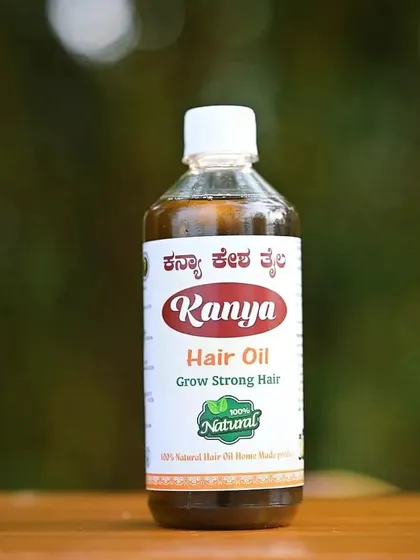 A simple, well-lit photo of the Kanya Hair Oil bottle, perfect for seeing the product clearly.