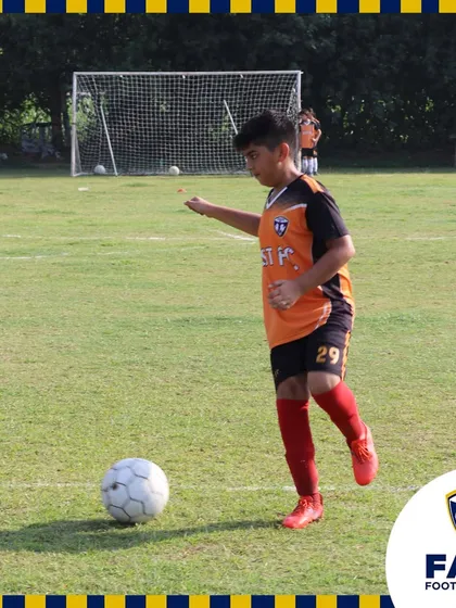 A player practices his shooting, a key skill for any aspiring forward.