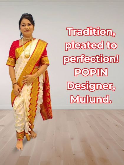 "Tradition, pleated to perfection!". This image from my store shows a classic white and red silk Nauvari, perfectly draped and ready for any auspicious occasion.