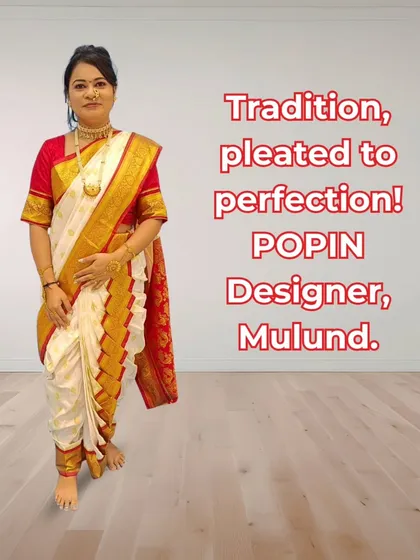 "Tradition, pleated to perfection!". This image from my store shows a classic white and red silk Nauvari, perfectly draped and ready for any auspicious occasion.