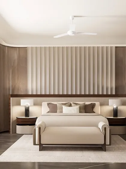 In this contemporary master bedroom for a Gurugram residence, we layered textures and materials to create depth. The space features veneer cladding, stitched leather panels, and custom lighting, all converging to form a sophisticated personal retreat.