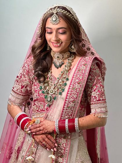 The complete soft glam look. The makeup is light and fresh, allowing her natural beauty to be the main focus.