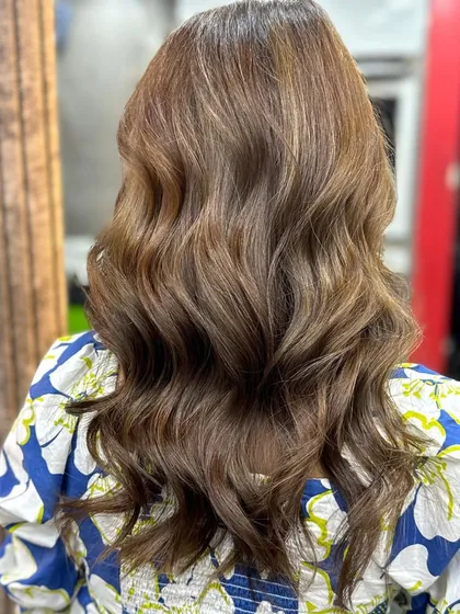 Another proud student moment. They executed this lovely hair makeover, creating a soft, blended color and styling it with classic waves for a timeless and polished look.