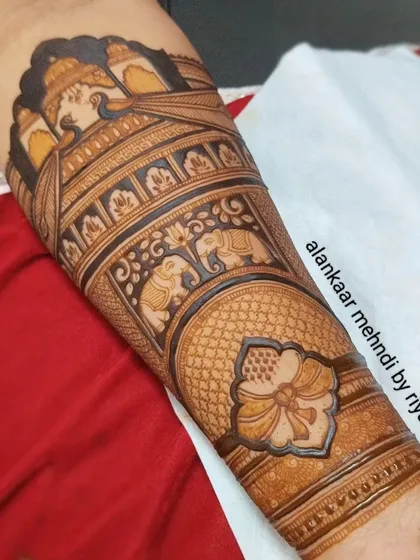 Another angle of the finished royal bridal arm, highlighting the beautiful contrast and intricate patterns.