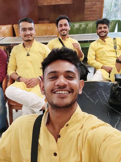 My team and I during a Haldi ceremony shoot. We believe in being part of the celebration to capture the most authentic and joyful moments.
