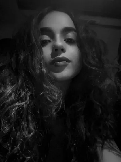 A raw, black and white close-up. This is the intensity and focus I bring to my craft. It's about sound, sweat, and vision, ready to give it my all for the dance floor.
