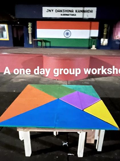 The Tangram Table set up in front of the school stage in Dakshina Kannada. We love taking our workshops on the road and bringing making to new communities.