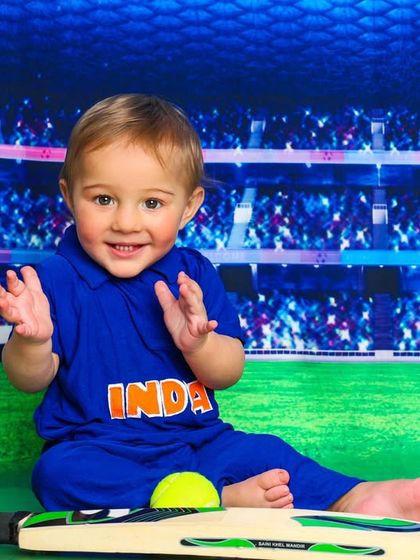 Clapping with excitement for the game. This little cricket fan's enthusiasm is absolutely contagious.