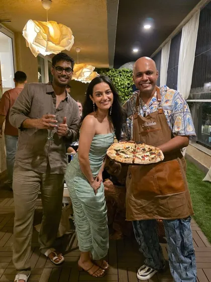 Posing with the lovely birthday host and her guest. Bringing smiles to people's faces with my pizza is what it's all about. This was a fantastic private catering event in Mumbai.