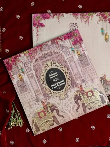 For a love story that feels like royalty. This regal Indian wedding invitation blends traditional motifs, like majestic elephants and palace architecture, with timeless elegance to announce your celebration in grand style.