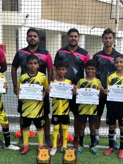 Our players and coaches proudly display their certificates of participation after a great performance at a local tournament. Every competition is a learning experience.