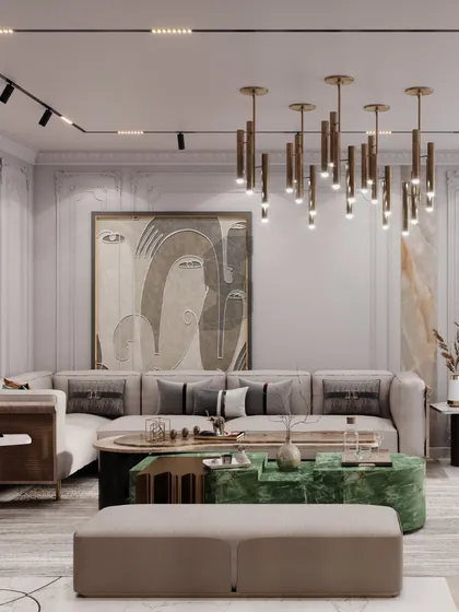 For this Punjabi Bagh living area, we blended neo-classical and modern styles. The design features timeless wall moldings paired with sleek, contemporary furniture and a striking brass chandelier, creating a sophisticated atmosphere that feels both classic and current.