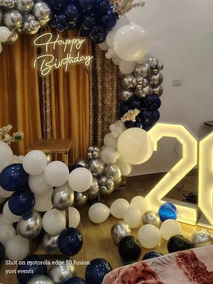 Another look at the stylish navy and silver setup, showing the illuminated number '26' which is a popular add-on for milestone birthdays.
