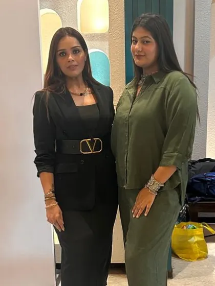 With my styling team member backstage. Teamwork is essential to pulling off a successful fashion show, and I'm proud of the incredible work we do together.