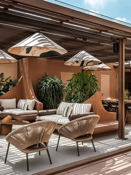 The Terra Gardens terrace by day, showcasing the interplay of light and shadow through the pergola. This view highlights the bespoke outdoor furniture, the integrated bar, and the lush plantings that make this a versatile space for all-day enjoyment.