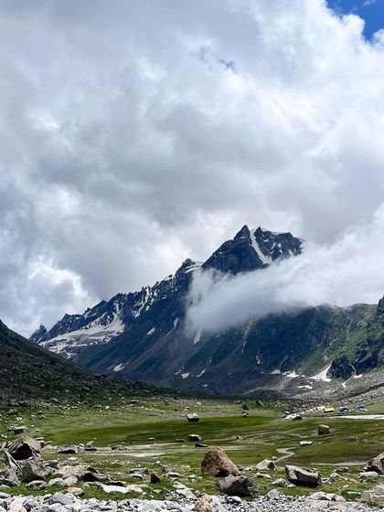 The dramatic, cloud-covered peaks of the Pir Panjal range, as seen on the Hampta Pass trek.