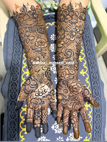 This design includes the name 'Affan' in Arabic script, beautifully written on the palm.