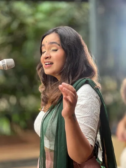 A candid shot of me singing during the 'Vari (The Live Sessions)' filming. This captures the pure joy I feel when I'm singing and expressing myself through music.