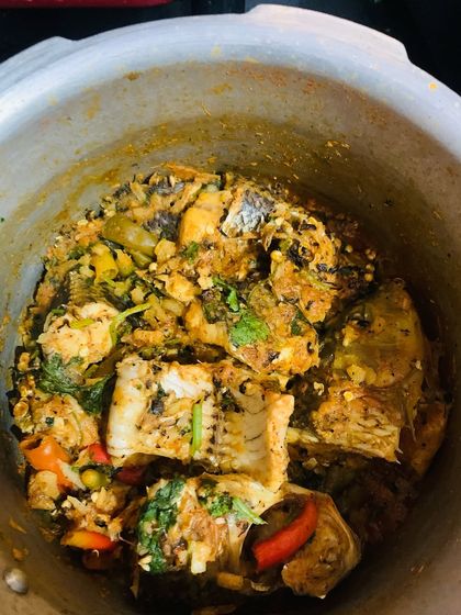 A pot of river fish curry, cooked in a traditional Naga style.