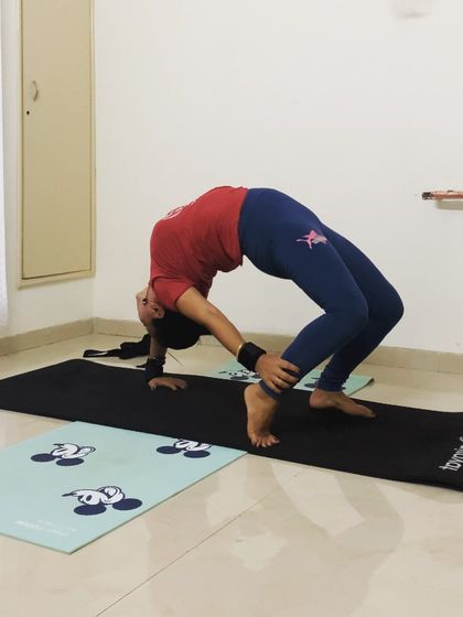 Asanas are a way to connect with oneself. This variation of Chakrasana (wheel pose) helps in activating the chakras that lie within our body.