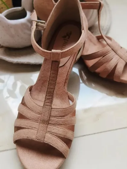 A sneak peek at the Neutral Beige version, coming soon. This color offers the same performance and comfort in a versatile shade that complements any dancewear. The open-toe design is a classic for Latin dance.