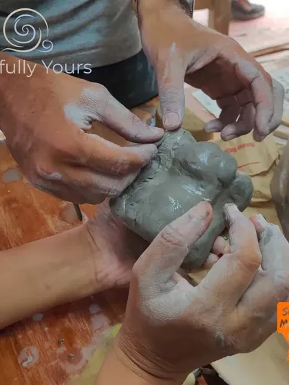 Two pairs of hands working together on a single piece. This image captures the collaborative and supportive spirit of my studio.