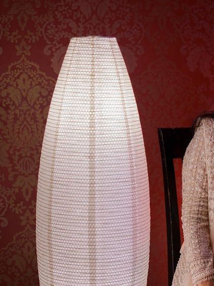 A creative collage from a wedding at the Courtyard by Marriott, blending a full-length shot with an artistic, moody portrait of the bride.