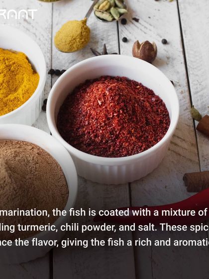 The fish is coated in a mixture of spices including turmeric, chili powder, and salt, which enhance the flavour and give it a rich, aromatic taste.