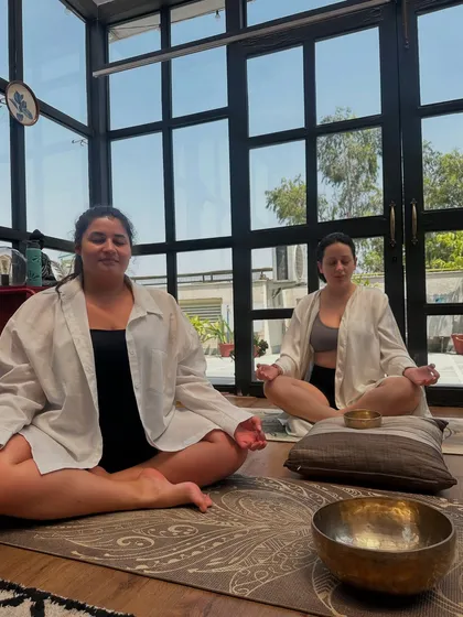 A moment of deep relaxation during a sound healing session. I use Tibetan bowls to create vibrations that help calm the mind and balance the body's energy centers.