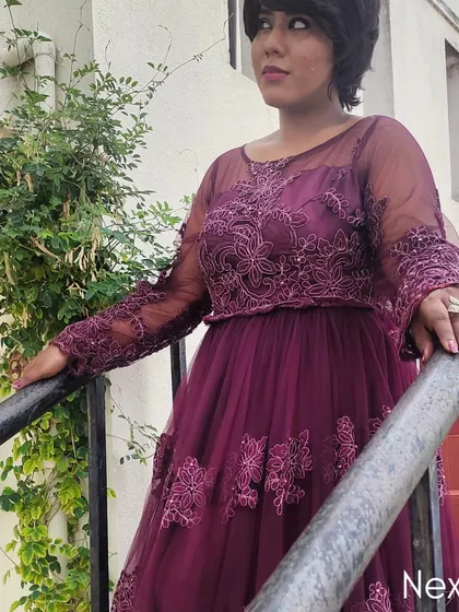 Looking out, ready for the event ahead. The right attire makes me feel prepared and professional.