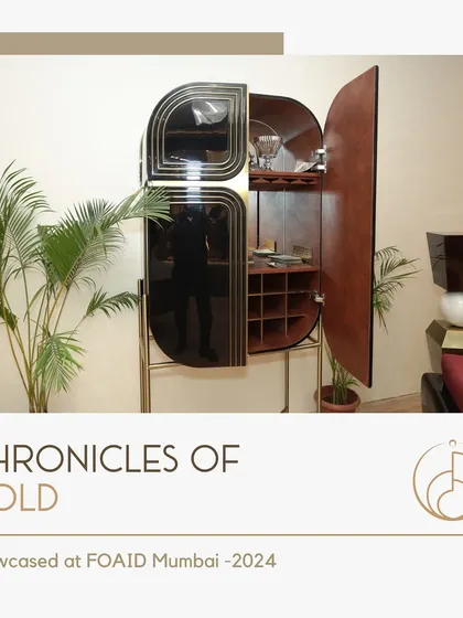 Our bespoke bar cabinet, featured in the "Chronicles of Gold" exhibition. This piece combines dark wood, black glass, and a sculptural form to create a functional work of art.