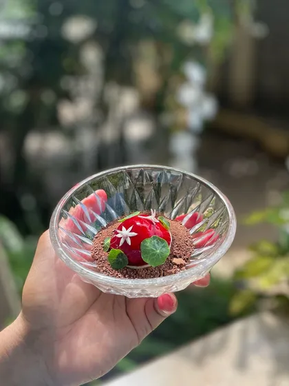 The Goose Liver Bonbon served in a crystal bowl, looking like a precious jewel.