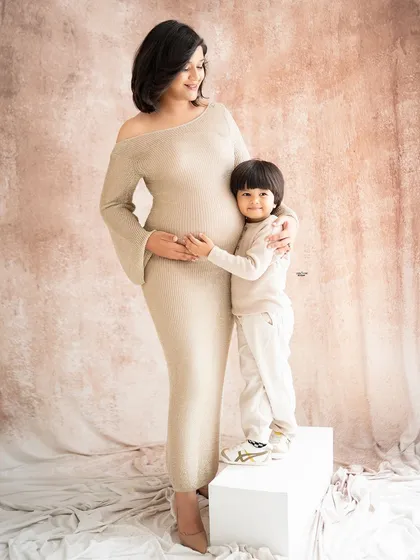 Another sweet mother-son moment. It's so clear how much love there is in this growing family.