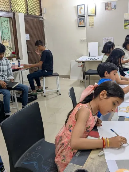 A view of our junior batch hard at work. Students are focused on their drawings, practicing the skills they've learned in class.