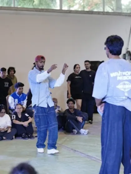 A tense moment in the 1v1 House battle at Spectra 2025. Dancers go head-to-head, showcasing their musicality, footwork, and freestyle skills.