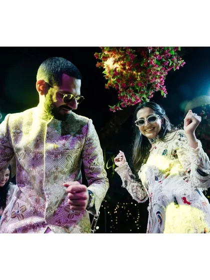 Deeksha smiles at Prakhar during a happy evening in Mumbai. This candid shot captures a simple, sweet moment of connection between the couple.