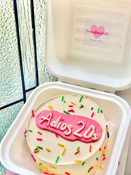 Saying 'Adios 20s' with a fun and colorful sprinkle bento cake. It's a sweet way to say goodbye to one decade and hello to the next.