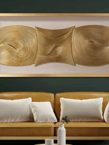 The Cosmic Currents shadow box is a mesmerizing piece of abstract art. The three-dimensional golden waves and swirls create a sense of movement and balance, perfect for a modern living room.