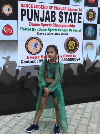 Our student at the Punjab State Dance Sports Championship. We prepare dancers for state and national level competitions, focusing on technique and stage presence.