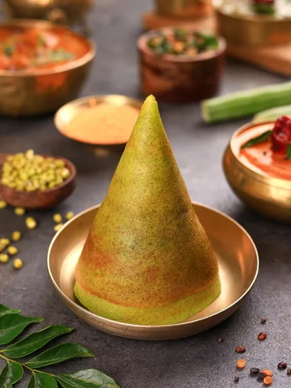 A green-tinted dosa, likely made with spinach or herbs. The unique colour is the hero here, styled simply to pique curiosity and highlight its healthy ingredients.