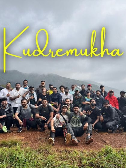 A successful summit. Our happy group posing for a photo at the top of Kudremukha.