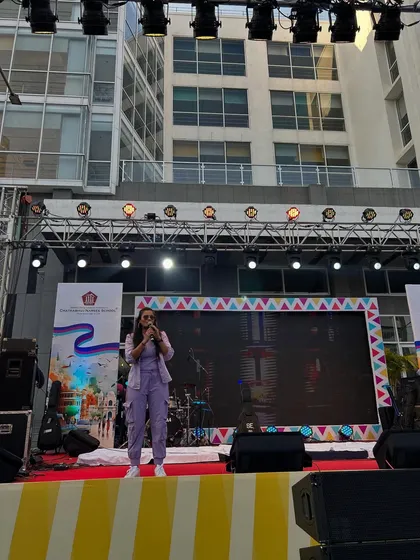 On the massive stage at the school carnival, where formalities drop and it's all about having fun.