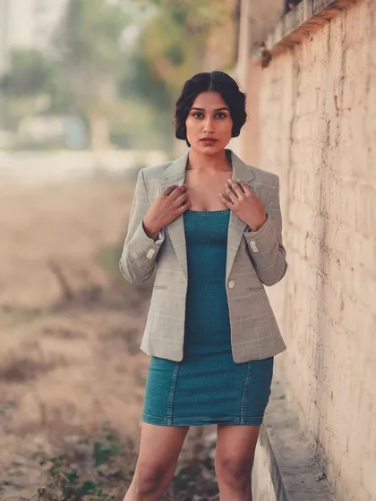 A final look from the denim dress series, showing how a simple change in pose can convey a different attitude.