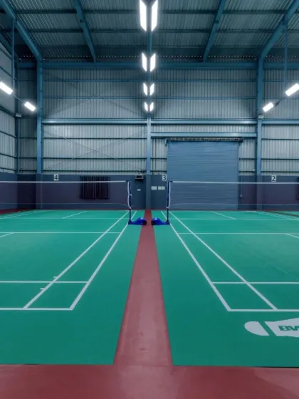 A symmetrical view of the courts, which are designed as per Badminton World Federation (BWF) standards.